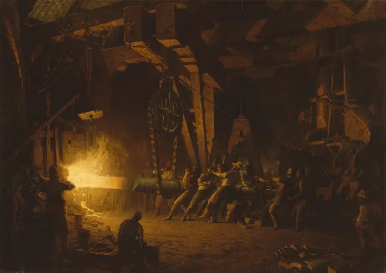 Workers forging a glowing iron shaft in a dark foundry